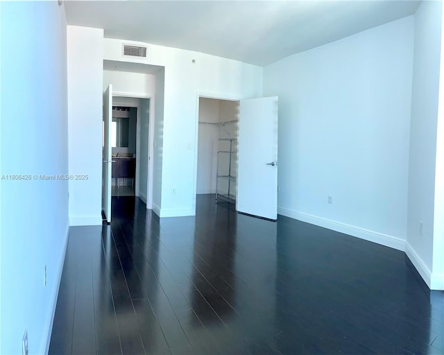 1900 N Bayshore Dr Unit 4708, Miami, FL 33132 - unfurnished room with dark wood finished floors and baseboards