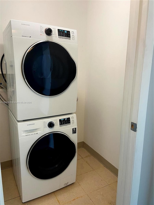 1900 N Bayshore Dr Unit 4708, Miami, FL 33132 - laundry room with estacked washer and dryer and light tile patterned floors