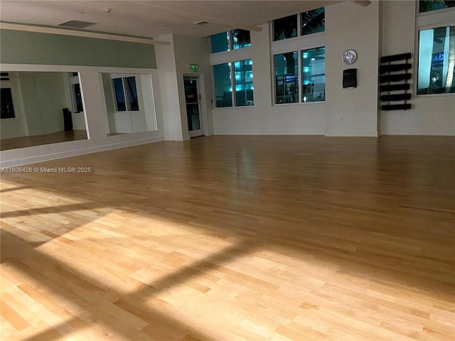 1900 N Bayshore Dr Unit 4708, Miami, FL 33132 - spare room featuring wood finished floors and a towering ceiling
