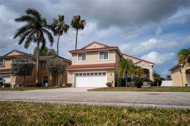 19121 NW 12th St, Pembroke Pines, FL 33029 - view of front of home with driveway, an attached garage, a tile roof, and stucco siding