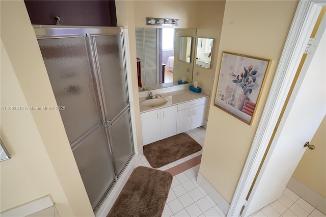 19121 NW 12th St, Pembroke Pines, FL 33029 - full bath featuring a stall shower, tile patterned floors, and vanity