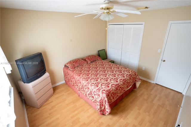 19121 NW 12th St, Pembroke Pines, FL 33029 - bedroom with light wood-type flooring, a closet, and baseboards