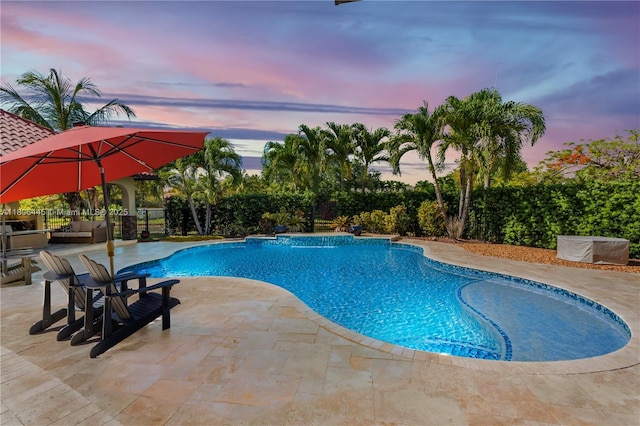 11915 Green Oak Dr, Davie, FL 33330 - pool at dusk with a patio and a fenced backyard