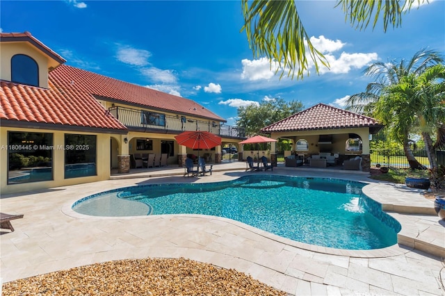 11915 Green Oak Dr, Davie, FL 33330 - view of swimming pool featuring an outdoor hangout area and a patio