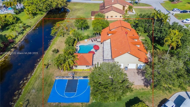 11915 Green Oak Dr, Davie, FL 33330 - aerial view of property's location featuring a nearby body of water, property parcel outlined, and a pool area