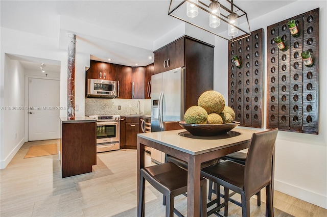 45 Antilla Ave Unit 1G, Coral Gables, FL 33134 - dining area featuring baseboards and recessed lighting