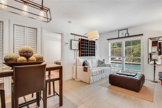 45 Antilla Ave Unit 1G, Coral Gables, FL 33134 - living area featuring baseboards and wood finished floors