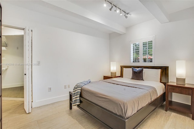 45 Antilla Ave Unit 1G, Coral Gables, FL 33134 - bedroom with track lighting and baseboards