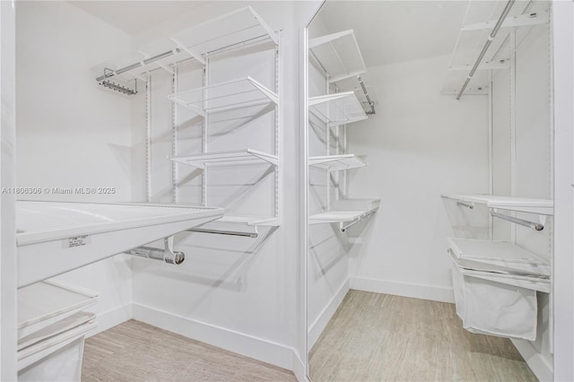 45 Antilla Ave Unit 1G, Coral Gables, FL 33134 - spacious closet with wood finished floors
