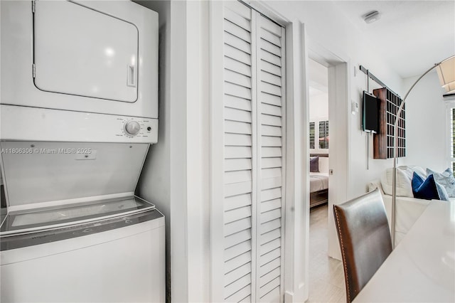 45 Antilla Ave Unit 1G, Coral Gables, FL 33134 - washroom featuring stacked washer and clothes dryer