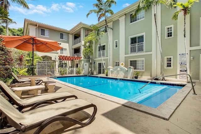 45 Antilla Ave Unit 1G, Coral Gables, FL 33134 - community pool featuring a patio