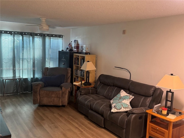1055 S Hiawassee Rd Unit 2014, Orlando, FL 32835 - living room with wood finished floors and a textured ceiling