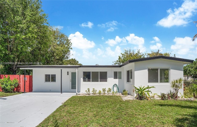 919 NW 13th St, Fort Lauderdale, FL 33311 - ranch-style home with stucco siding and concrete driveway