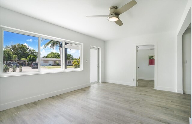 919 NW 13th St, Fort Lauderdale, FL 33311 - spare room featuring ceiling fan, baseboards, and wood finished floors