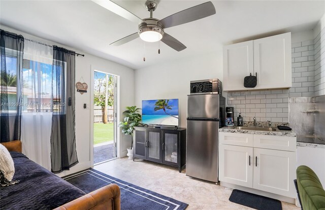 919 NW 13th St, Fort Lauderdale, FL 33311 - living area with ceiling fan