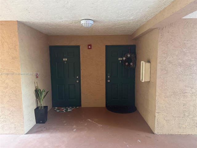 3854 Lyons Rd Unit 207-5, Coconut Creek, FL 33073 - doorway to property featuring stucco siding