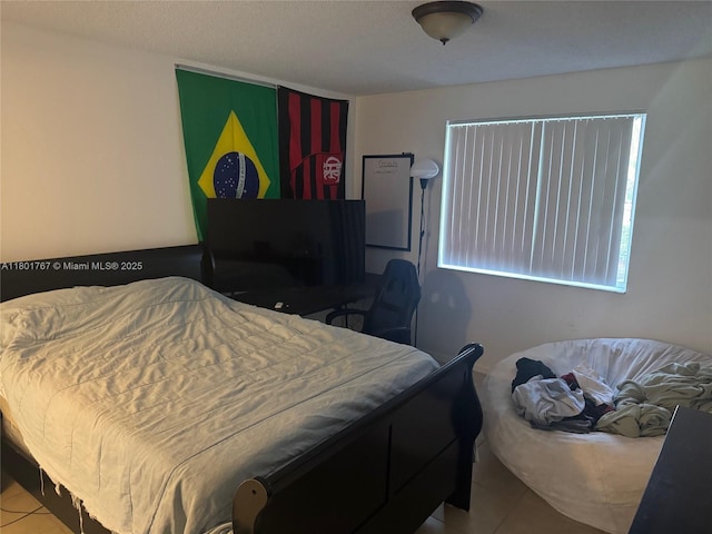 3854 Lyons Rd Unit 207-5, Coconut Creek, FL 33073 - bedroom featuring tile patterned flooring