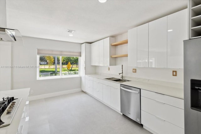 1459 Jefferson St, Hollywood, FL 33020 - kitchen featuring open shelves, appliances with stainless steel finishes, a sink, light countertops, and modern cabinets