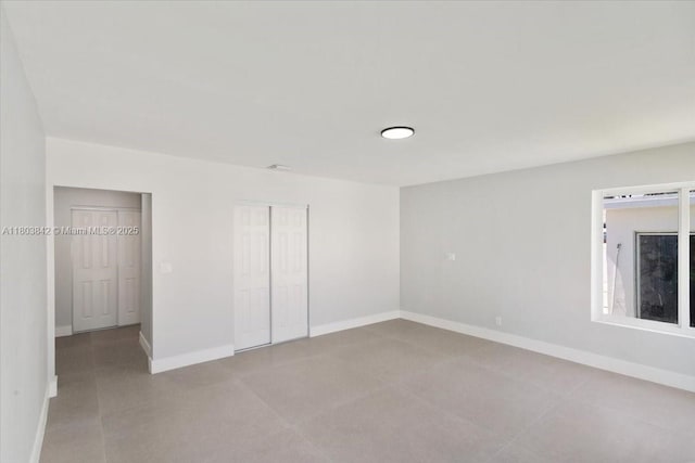 1459 Jefferson St, Hollywood, FL 33020 - unfurnished bedroom featuring baseboards and a closet