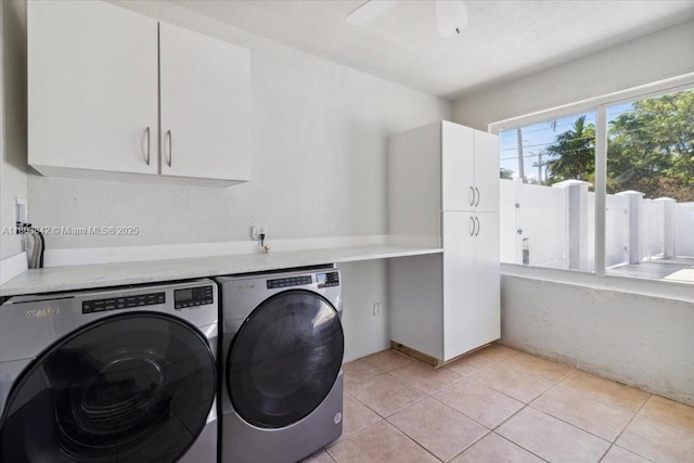 1459 Jefferson St, Hollywood, FL 33020 - laundry room featuring cabinet space, independent washer and dryer, and light tile patterned floors