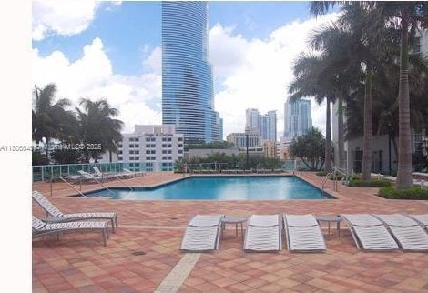 41 SE 5th St Unit 2317, Miami, FL 33131 - community pool featuring a patio and a city view