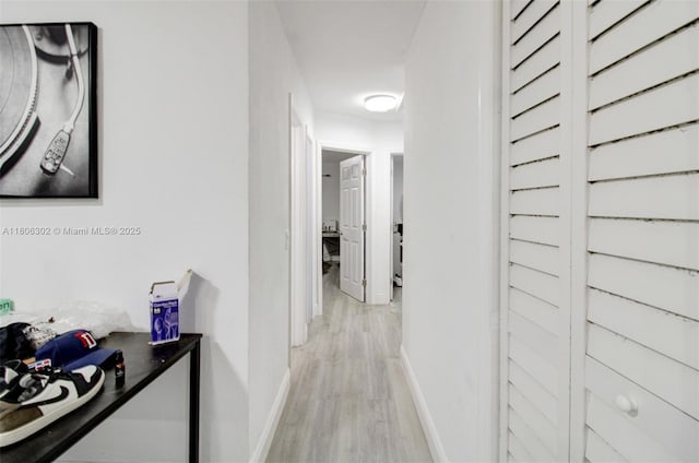 5510 NW 30th Ave, Miami, FL 33142 - hall featuring light wood-style floors and baseboards