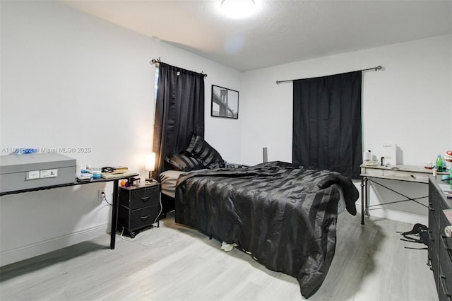 5510 NW 30th Ave, Miami, FL 33142 - bedroom with wood finished floors and baseboards
