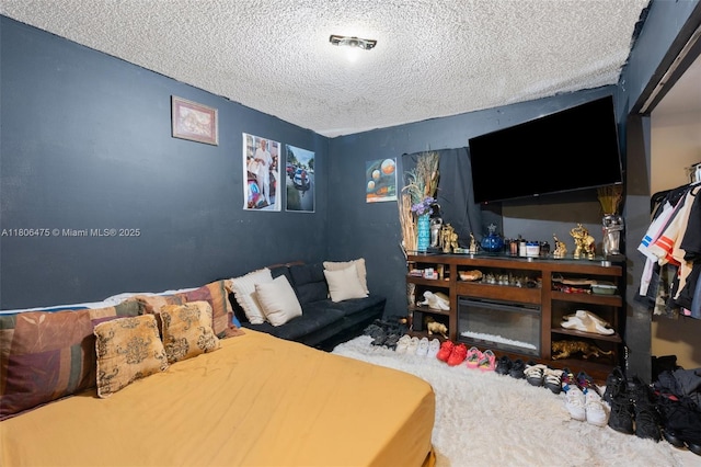 2401 NW 56th Ave Unit 3-202, Lauderhill, FL 33313 - bedroom featuring a textured ceiling