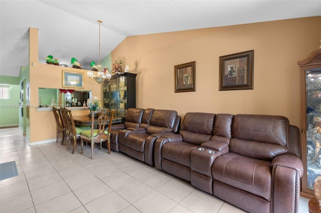2401 NW 56th Ave Unit 3-202, Lauderhill, FL 33313 - living room with a chandelier, lofted ceiling, light tile patterned floors, and baseboards