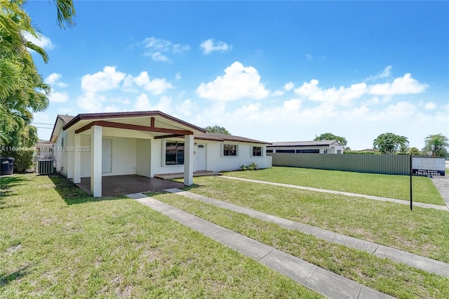 3521 SW 105th Ct, Miami, FL 33165 - back of house with stucco siding, driveway, an attached carport, and cooling unit