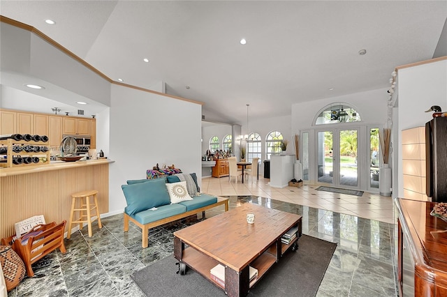 5362 NW 108th Way, Coral Springs, FL 33076 - living room featuring recessed lighting, a towering ceiling, and french doors