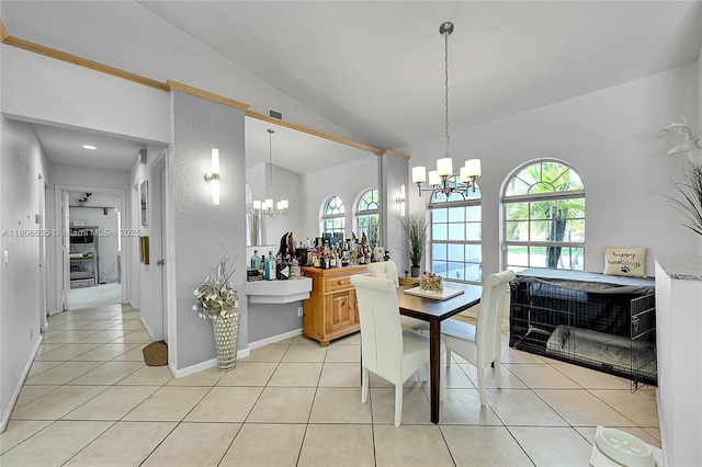 5362 NW 108th Way, Coral Springs, FL 33076 - dining space with a chandelier, vaulted ceiling, healthy amount of natural light, light tile patterned floors, and baseboards