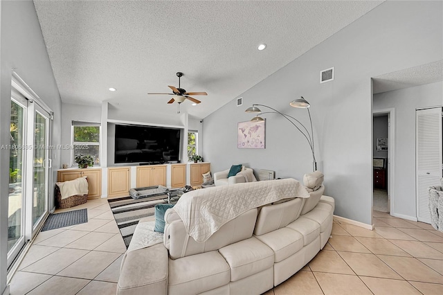 5362 NW 108th Way, Coral Springs, FL 33076 - living room with a textured ceiling, light tile patterned floors, a ceiling fan, lofted ceiling, and recessed lighting