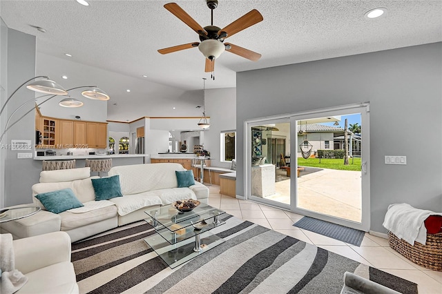 5362 NW 108th Way, Coral Springs, FL 33076 - living area with ceiling fan, light tile patterned flooring, a textured ceiling, recessed lighting, and a towering ceiling
