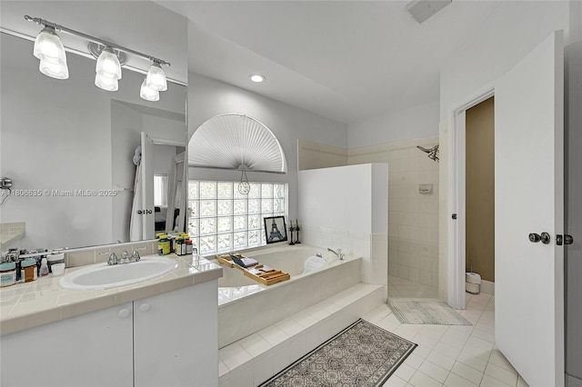 5362 NW 108th Way, Coral Springs, FL 33076 - bathroom with tiled shower, a bath, tile patterned flooring, vanity, and recessed lighting