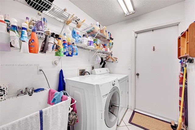 5362 NW 108th Way, Coral Springs, FL 33076 - washroom with independent washer and dryer, light tile patterned floors, and a textured ceiling