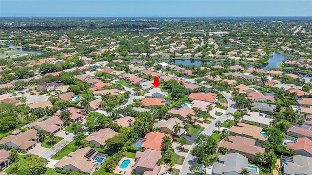 5362 NW 108th Way, Coral Springs, FL 33076 - aerial overview of property's location with a large body of water and nearby suburban area
