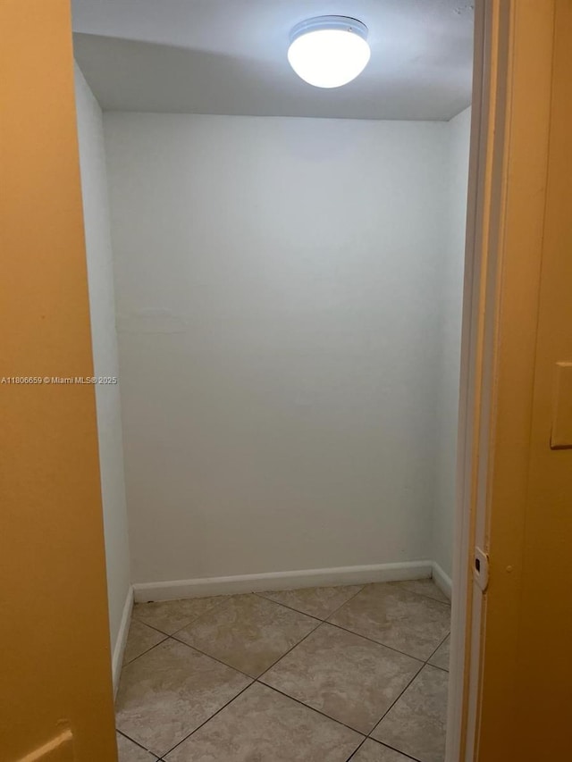 4017 N University Dr Unit 210, Sunrise, FL 33351 - empty room featuring baseboards and light tile patterned floors