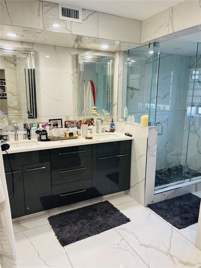 7736 Lakeside Blvd Unit G205, Boca Raton, FL 33434 - bathroom with marble tiled flooring, a marble finish shower, and double vanity