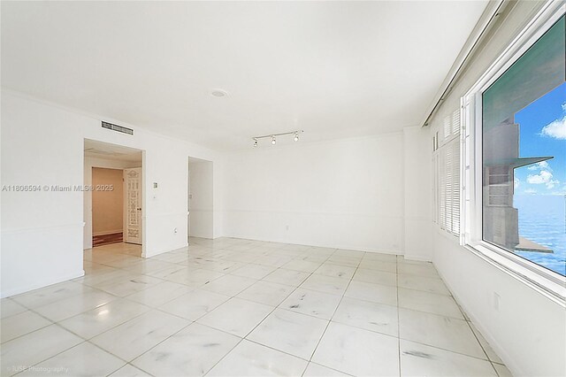 5255 Collins Ave Unit 14D, Miami Beach, FL 33140 - unfurnished room featuring light tile patterned floors