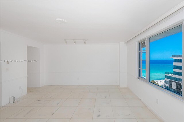 5255 Collins Ave Unit 14D, Miami Beach, FL 33140 - empty room featuring ornamental molding