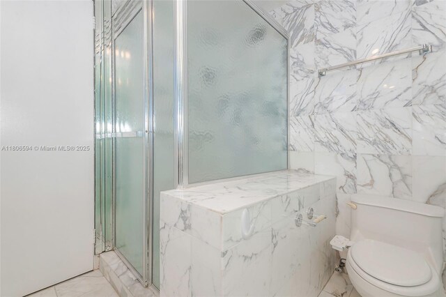 5255 Collins Ave Unit 14D, Miami Beach, FL 33140 - full bathroom with a shower stall, marble look tiles, and toilet