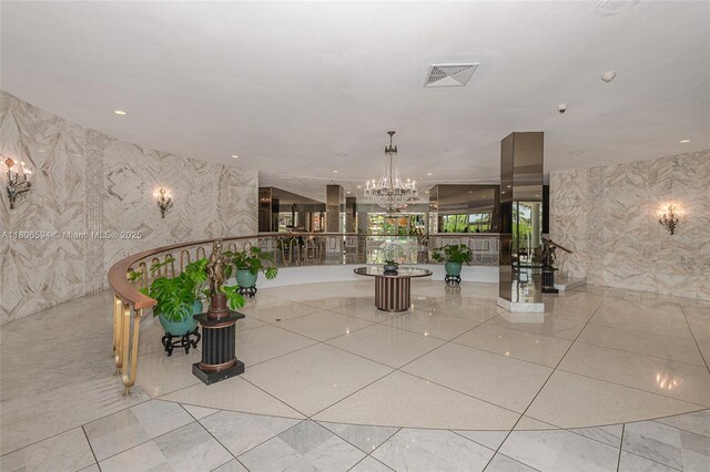 5255 Collins Ave Unit 14D, Miami Beach, FL 33140 - building lobby with wallpapered walls and recessed lighting