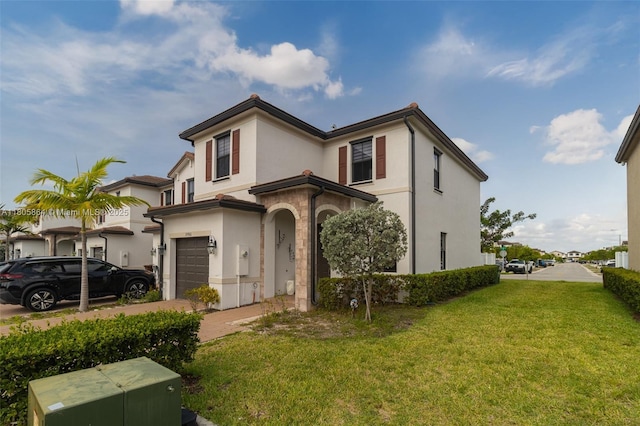 10966 W 33rd Way, Hialeah, FL 33018 - view of front of house featuring an attached garage, stucco siding, and a front yard