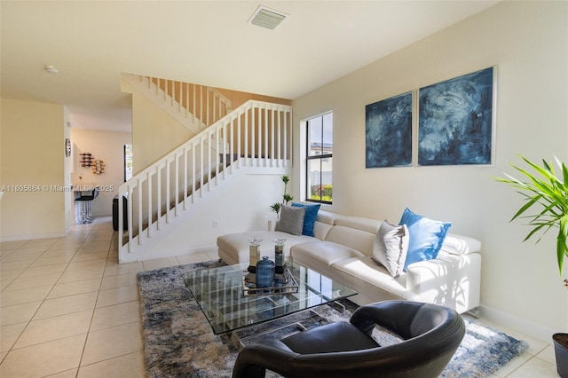 10966 W 33rd Way, Hialeah, FL 33018 - tiled living room featuring stairs and baseboards
