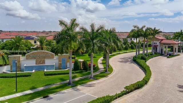 10966 W 33rd Way, Hialeah, FL 33018 - surrounding community featuring curved driveway, a residential view, and a yard