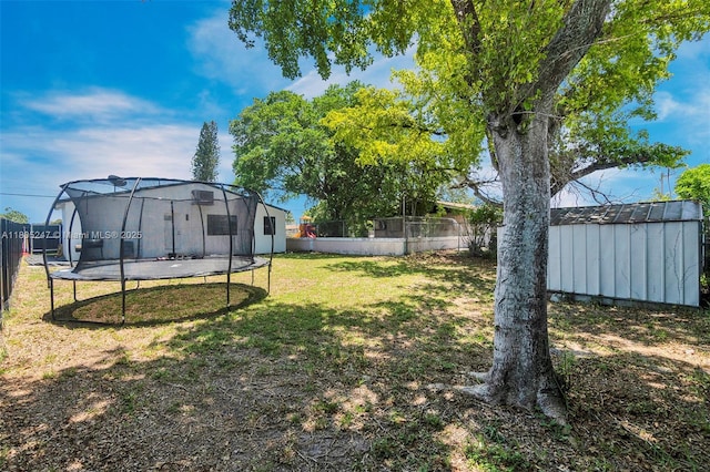 4029 SW 22nd St, West Park, FL 33023 - fenced backyard featuring a trampoline and a shed