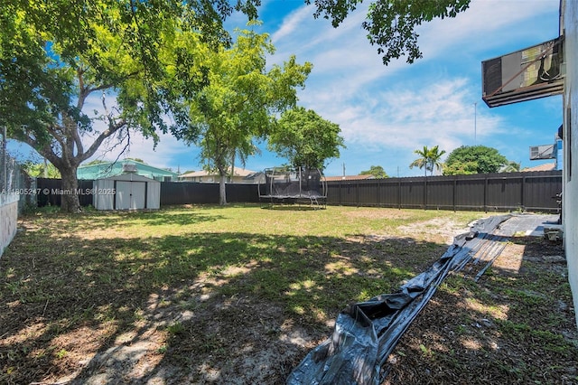 4029 SW 22nd St, West Park, FL 33023 - fenced backyard with a trampoline and a storage shed
