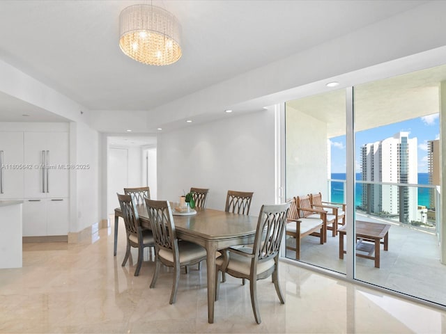 200 Sunny Isles Blvd Unit 2-Uph3, Sunny Isles Beach, FL 33160 - dining space featuring a chandelier, floor to ceiling windows, recessed lighting, and light marble finish flooring