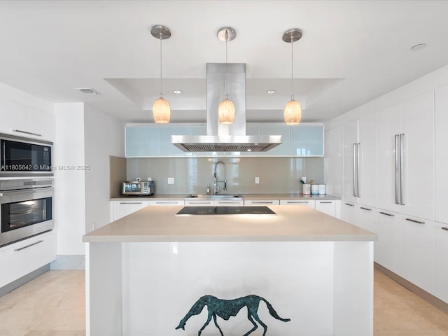200 Sunny Isles Blvd Unit 2-Uph3, Sunny Isles Beach, FL 33160 - kitchen featuring stainless steel oven, built in microwave, modern cabinets, island range hood, and a sink